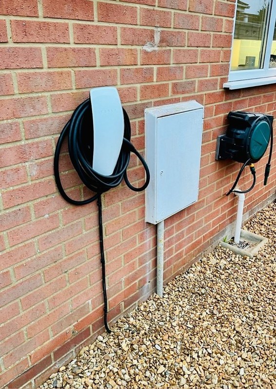 EV charging image related to Outdoor EV Charger Fundamentals: Connectors, Power, and Vehicle Limits