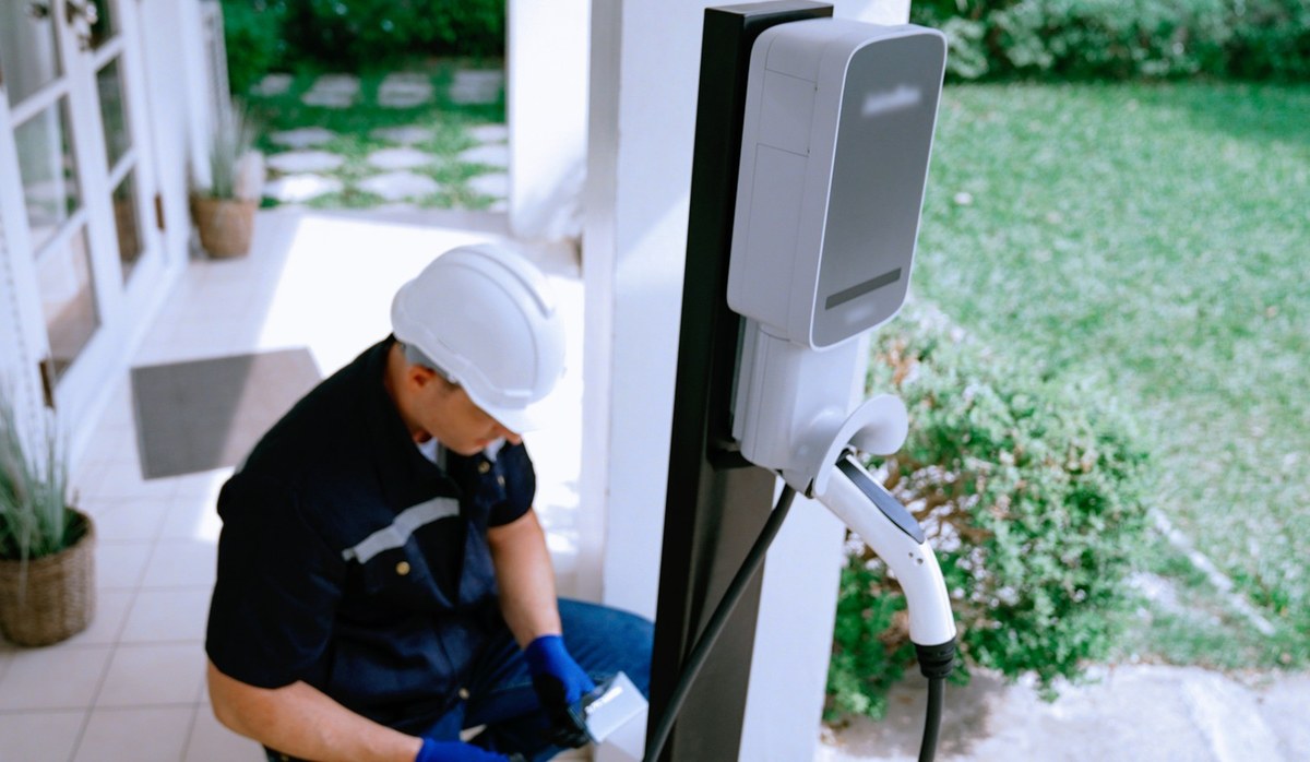 EV charging image related to Weather Suitability, Smart Features, and Warranty for Outdoor EVSE
